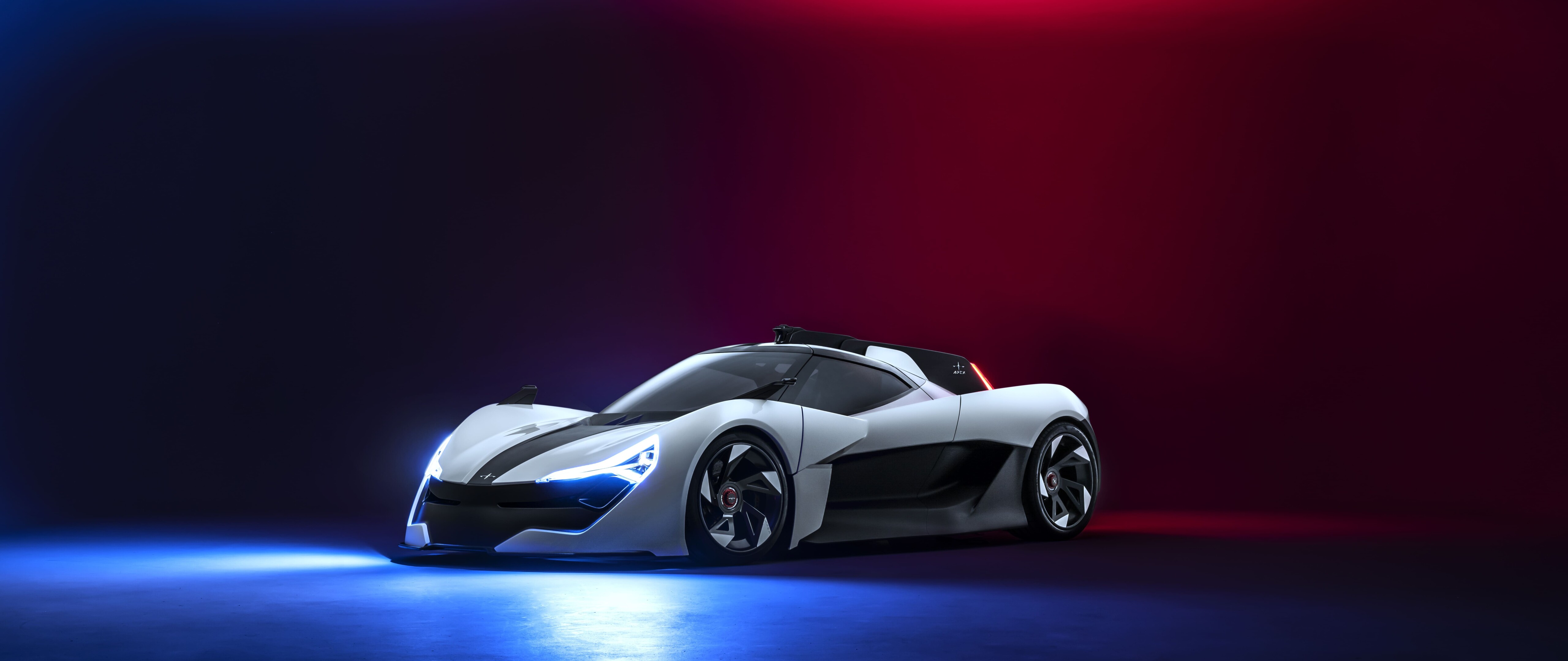 Un elegante y aerodinámico coche deportivo moderno, presentado en un estudio profesional.